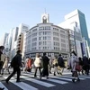 Người dân đeo khẩu trang phòng lây nhiễm COVID-19 tại Tokyo, Nhật Bản, ngày 3/2/2022. (Ảnh: Kyodo/TTXVN)
