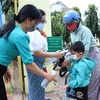 Học sinh mầm non trường Mầm non Tân Thành, thành phố Buôn Ma Thuột ngày đầu tiên đến trường trong năm học 2021-2022. (Ảnh: Tuấn Anh/TTXVN)