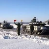Xe tăng Nga rời đi sau cuộc tập trận chung với Belarus. (Nguồn: AFP)