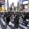Người dân đeo khẩu trang phòng dịch COVID-19 tại Tokyo, Nhật Bản, ngày 3/2/2022. (Ảnh: Kyodo/TTXVN)