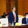 Bộ trưởng Bộ Giáo dục và Đào tạo Nguyễn Kim Sơn phát biểu tại phiên giải trình. (Ảnh: An Đăng/TTXVN)