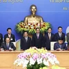 Thủ tướng Phạm Minh Chính và Thủ tướng Lào Phankham Viphavanh chứng kiến Lễ ký kết thoả thuận về Kế hoạch hợp tác Việt Nam-Lào năm 2022. (Ảnh: Dương Giang/TTXVN)