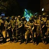 Cảnh sát được triển khai để giải tán người biểu tình ở thủ đô Colombo, Sri Lanka tối 31/3/2022. (Ảnh: AFP/TTXVN)