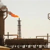 Một cơ sở lọc dầu tại Baiji, Iraq. (Ảnh: AFP/TTXVN)