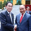 Chủ tịch nước Nguyễn Xuân Phúc tiếp Thủ tướng Nhật Bản Kishida Fumio. (Ảnh: Thống Nhất/TTXVN)