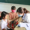  Khám sàng lọc và tiêm vắc xin phòng bệnh bạch hầu cho trẻ trong khu dân cư có bệnh nhân mắc bạch hầu tại huyện Lắk, Đắk Lắk tháng 8/2020.( Ảnh: Tuấn Anh/TTXVN)