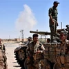 Các lực lượng trung thành với Chính phủ Syria trong một chiến dịch tại tỉnh Deir Ezzor. (Ảnh: AFP/TTXVN)