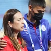 Nữ trưởng đoàn U23 Thái Lan Madam Pang không giấu được vẻ mặt buồn bã sau thất bại ở trận ra quân. (Ảnh: Thanh Tùng/TTXVN)