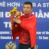 VĐV Lý Hoàng Nam (Việt Nam) nhận HCV nội dung đơn nam môn Quần vợt SEA Games 31. (Ảnh: Thế Duyệt/TTXVN)