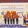 Đôi Aerobic Việt Nam giành HCV; Campuchia giành HCB; Thái Lan giành HCĐ nội dung nhóm 5 người. (Ảnh: Tuấn Đức/TTXVN)