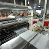 Dây chuyền sản xuất túi nhựa xuất khẩu tại nhà máy của Công ty Cổ phần HAPLAST. (Ảnh: Vũ Sinh/TTTXVN)