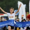 Nguyễn Thị Kim Luyến trở thành nhà vô địch cự ly 5km nữ Giải chạy VnExpress Marathon Quy Nhơn 2022. (Ảnh: Nguyên Linh/TTXVN)