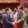 Thủ tướng Phạm Minh Chính và Thủ tướng Campuchia Hun Sen tại Lễ kỷ niệm 45 năm Con đường tiến tới đánh đổ chế độ diệt chủng Pol Pot của Thủ tướng Campuchia Hun Sen (20//6/1977 - 20/6/2022) ở tỉnh Tbong Khmum, sáng 20/6/2022. (Ảnh: Dương Giang/TTXVN)