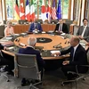 Các đại biểu tham dự Hội nghị thượng đỉnh Nhóm các nền công nghiệp phát triển hàng đầu thế giới (G7) ở lâu đài Elmau thuộc bang Bayern (Đức), ngày 26/6/2022. (Ảnh: AFP/TTXVN)