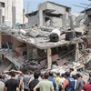 Nhà cửa bị phá hủy sau loạt không kích của Israel xuống Dải Gaza ngày 6/8/2022. (Ảnh: THX/TTXVN)