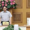 Thủ tướng Phạm Minh Chính chủ trì họp ứng phó cơn bão số 4-Noru. (Ảnh: Dương Giang/TTXVN)