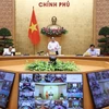 Thủ tướng Phạm Minh Chính chủ trì Hội nghị trực tuyến Chính phủ với địa phương và Phiên họp Chính phủ thường kỳ tháng 9 năm 2022. (Ảnh: Dương Giang/TTXVN)