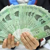 Đồng tiền mệnh giá 10.000 won của Hàn Quốc. (Ảnh: AFP/TTXVN)