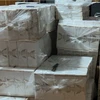 Hàng chục nghìn bao thuốc lá lậu được thu giữ tại nhà của đối tượng Út. (Nguồn: cand.com.vn)