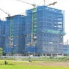  Công trình xây dựng Bệnh viện Đa khoa khu vực Hóc Môn bị chậm tiến độ so với kế hoạch. (Ảnh: Đinh Hằng/TTXVN)