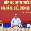 [Photo] Chủ tịch nước Nguyễn Xuân Phúc tiếp xúc cử tri tại TP.HCM