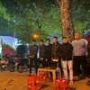 7 đối tượng tự lập bãi trông xe, thu tiền trái phép đã bị lực lượng chức năng bắt giữ. (Nguồn: laodong.vn)