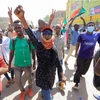 Người biểu tình đổ xuống đường phố ở Khartoum yêu cầu lập lại chế độ dân sự. (Nguồn: Reuters)