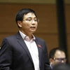 Bộ trưởng Bộ Giao thông Vận tải Nguyễn Văn Thắng trả lời chất vấn. (Ảnh: An Đăng/TTXVN)