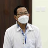 Bị cáo Cao Minh Quang (sinh năm 1956, cựu Thứ trưởng Bộ Y tế) tại phiên xét xử sơ thẩm. (Ảnh: Phạm Kiên/TTXVN)