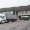 Xe hàng xuất khẩu của Việt Nam sang Trung Quốc qua cửa khẩu Lào Cai. (Ảnh: Hồng Ninh/TTXVN)