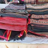 Nhãn hiệu chứng nhận Dệt Thổ cẩm Kon Tum (Ban Dân tộc tỉnh Kon Tum) với sản phẩm là các tấm vải thô nhiều chi tiết, màu sắc mang đậm bản sắc của các dân tộc tại chỗ. (Ảnh: Khoa Chương/TTXVN)