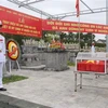 Lễ truy điệu, an táng hài cốt liệt sỹ quân tình nguyện Việt Nam hy sinh tại Lào tại Nghĩa trang quốc gia Tông Khao. (Ảnh: Xuân Tiến/TTXVN)