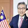 Ngoại trưởng Hàn Quốc Park Jin điện đàm với người đồng cấp Malaysia, Zambry Abdul Kadir ngày 6/1 (Nguồn: Yonhap)