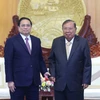 [Photo] Thủ tướng đến thăm các vị nguyên lãnh đạo nước CHDCND Lào