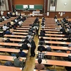 Các học sinh Nhật Bản chuẩn bị làm bài thi trong kỳ tuyển sinh đại học tại trường Đại học Tokyo ngày 15/1/2022. (Nguồn: The Asahi Shimbun)
