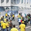 Ngày 8/1/2023, những người ủng hộ cựu Tổng thống Brazil Jair Bolsonaro đã xông vào trụ sở Quốc hội, Tòa án Tối cao và Dinh Tổng thống để gây rối. (Ảnh: AFP/TTXVN)