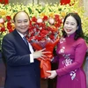 [Photo] Nguyên Chủ tịch nước Nguyễn Xuân Phúc bàn giao công tác
