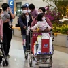Hành khách đeo khẩu trang phòng ngừa COVID-19 tại Sân bay Quốc tế Incheon, Hàn Quốc ngày 3 tháng 1 năm 2020. (Nguồn: Reuters)