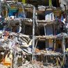 Tòa nhà bị phá hủy sau trận động đất tại Adiyaman, Thổ Nhĩ Kỳ, ngày 18/2/2023. (Ảnh: THX/TTXVN)