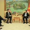 Phó Thủ tướng Trần Hồng Hà tiếp ông Simon Harford, Giám đốc Quỹ Liên minh Năng lượng toàn cầu cho con người và hành tinh - GEAPP. (Ảnh: TTXVN phát)