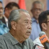 Cựu Thủ tướng Malaysia Muhyiddin Yassin phát biểu tại cuộc họp báo ở Kuala Lumpur, Malaysia, ngày 24/11/2022. (Ảnh: AFP/TTXVN)