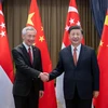 Thủ tướng Singapore Lý Hiển Long (trái) gặp Chủ tịch Trung Quốc Tập Cận Bình bên lề Hội nghị các nhà lãnh đạo kinh tế APEC lần thứ 29 tại Thái Lan tháng 11/2022. (Ảnh: THX/TTXVN)