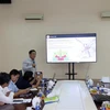 Chuyên gia phân tích phát triển đô thị theo mô hình TOD trong tuyến đường sắt Thành phố Hồ Chí Minh-Cần Thơ. (Ảnh: Tiến Lực/TTXVN)