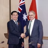 Chủ tịch Quốc hội Vương Đình Huệ tiếp Thượng nghị sỹ, Bộ trưởng Thương mại và Du lịch Australia Don Farrell tại Hà Nội ngày 30/11/2022. (Ảnh: Doãn Tấn/TTXVN)