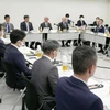 Các thành viên hội đồng chuyên gia của chính phủ Nhật Bản trong cuộc họp về chương trình thực tập sinh ngày 28/4. (Nguồn: Kyodo)