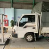 Thủ tục đăng kiểm tại Trung tâm Đăng kiểm xe cơ giới 24-04D, thành phố Lào Cai. (Ảnh: Quốc Khánh/TTXVN)