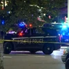 Cảnh sát Mỹ làm việc tại hiện trường vụ xả súngở phía Nam Seattle. (Nguồn: CNN)