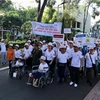 Hơn 5.000 người đi bộ đồng hành vì nạn nhân độc da cam/dioxin Việt Nam nhân tháng hành động vì nạn nhân chất độc da cam/dioxin và kỷ niệm 62 năm ngày thảm họa da cam/dioxin ở VN 10/8/1961-10/8/2023. (Ảnh: Thanh Vũ/TTXVN)