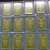 Vàng miếng SJC bày bán tại Công ty Vàng bạc Agribank. (Ảnh: Trần Việt/TTXVN)