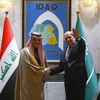 Ngoại trưởng Iraq Fuad Hussein (phải) và Ngoại trưởng Saudi Arabia Faisal bin Farhan Al-Saud tại cuộc gặp ở Baghdad ngày 2/2/2023. (Ảnh: AFP/ TTXVN)